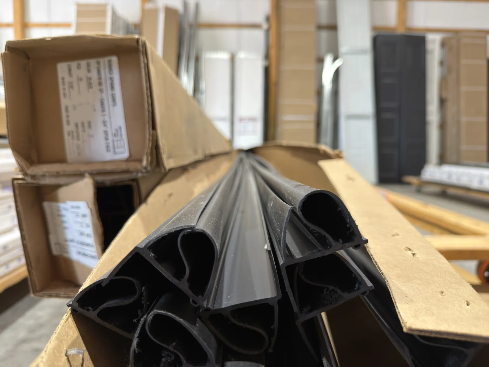 Cross-section view of flexible garage door seal profiles