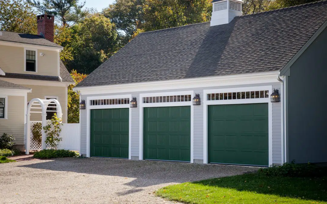 house with green garage doors